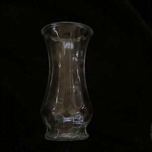 Vase of heavy pressed glass with sunburst bottom creating button look effect